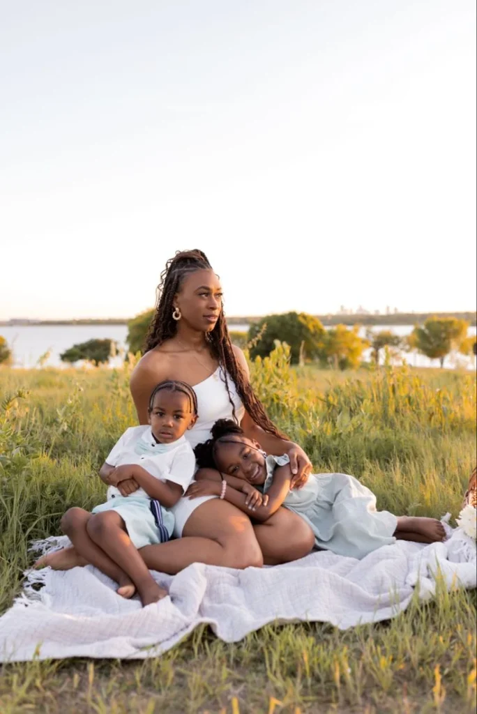 Mother with children enjoying a peaceful moment, representing family protection through proper life insurance beneficiary planning
.