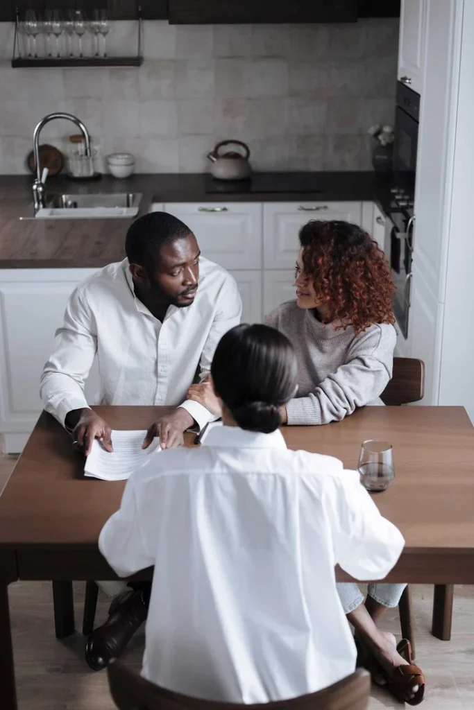 Black homeowners reviewing estate planning documents to protect family wealth in Maryland