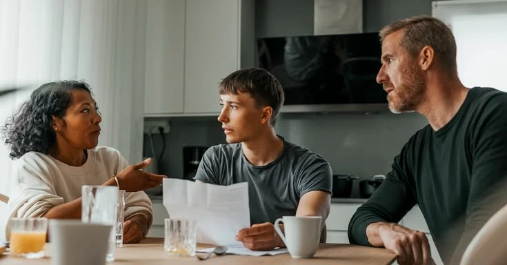 529 Withdrawals vs College Tuition Payment Plans: What to Choose First This Fall? Parent reviewing 529 withdrawals and college tuition payment plan options
