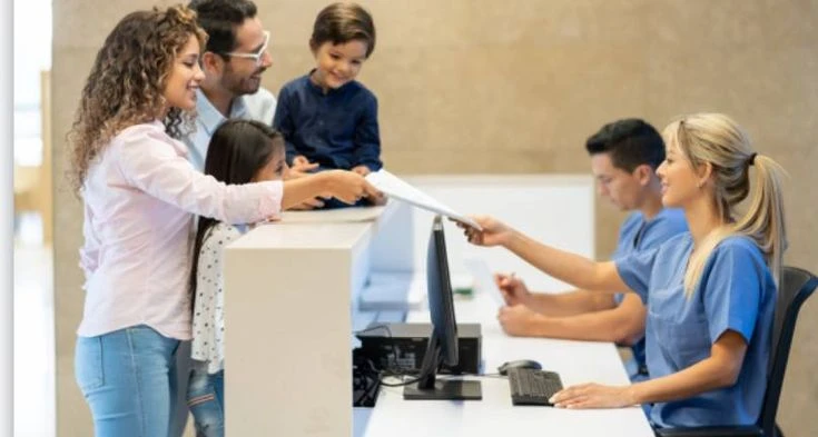 Patient at hospital admissions desk