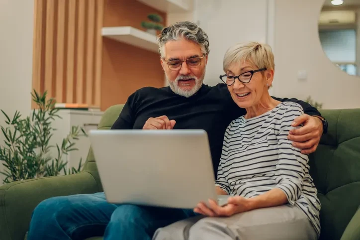 401k Catch Up Contributions: Why August Is the Last Reasonable Month to Start Couples aged 50 reviewing 401k catch up contribution