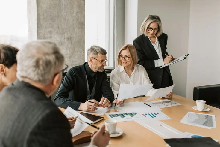 The Family Office Model: A Multi-Generational Wealth Preservation Strategy Multigenerational family reviewing their family office model
