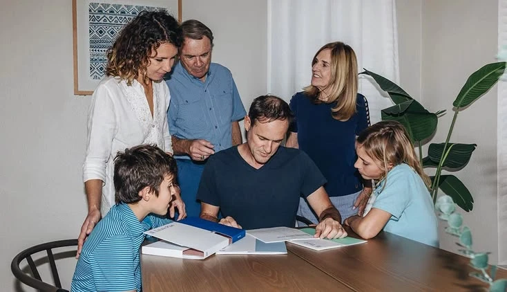 An American family reviewing financial documents