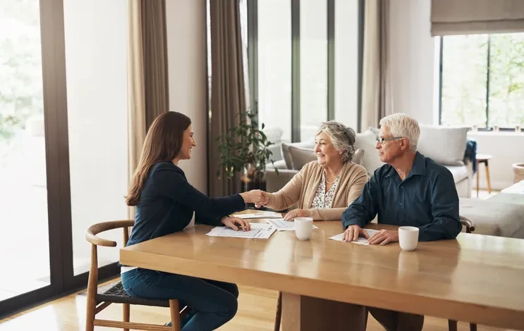 Financial advisor walking clients through the trust vs probate decision over estate documents
