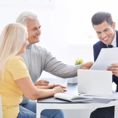 Couple reviewing trust and probate documents 