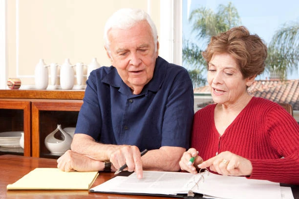 Long Term Care Options: Why Delaying Now Raises Your Premiums Adults reviewing long term care insurance options