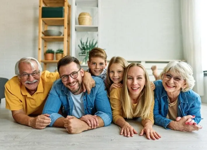 Three generations of a family discussing a stewardship mindset and generational wealth