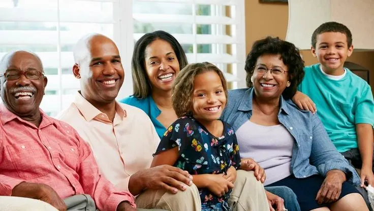 How the Ten Domains of Family Wealth Build True Generational Wealth Three generations of a family discussing family wealth planning